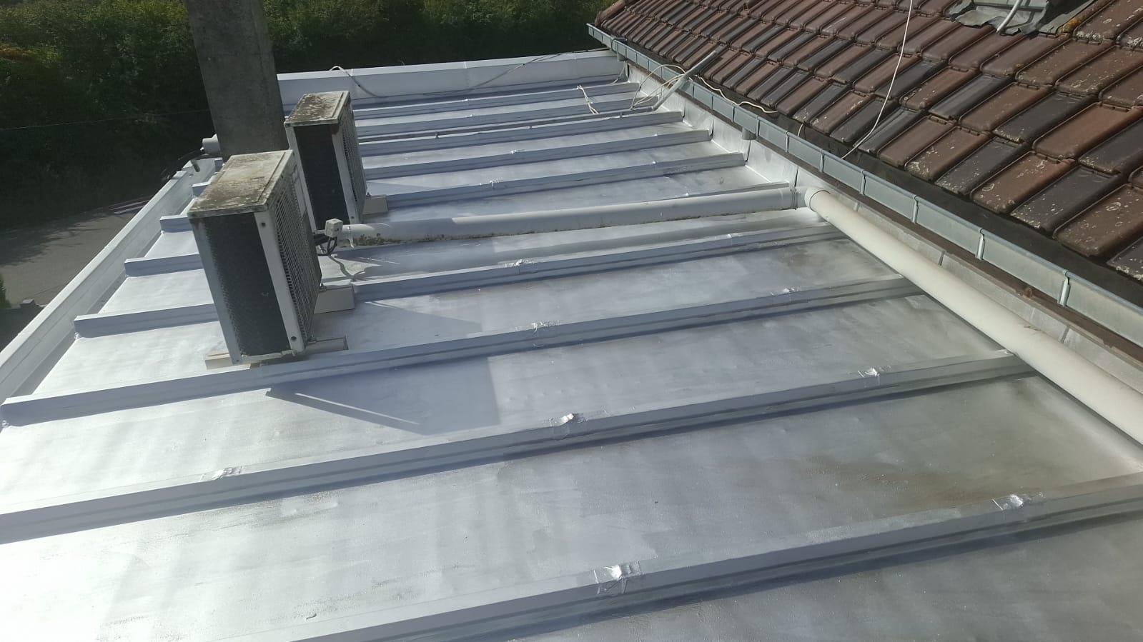 Toiture plate refaite